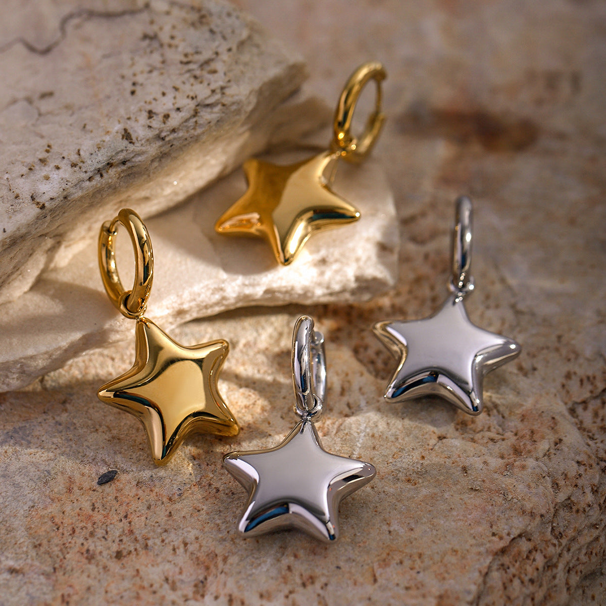 Pendientes tridimensionales de estrella de cinco puntas