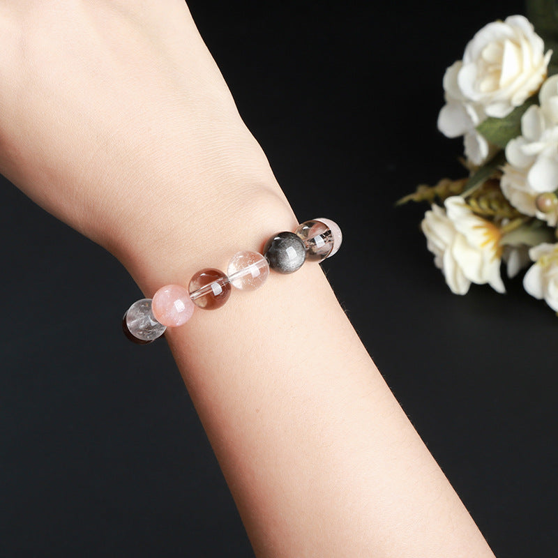 Pulsera de cuentas redondas con hilo mixto de obsidiana plateada y cristal blanco de té