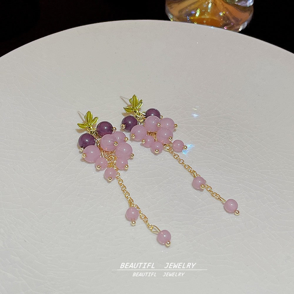 Pendientes largos de flores rosas para mujer