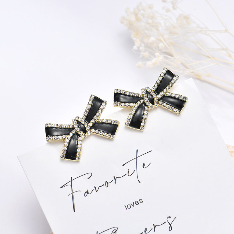 Pendientes con flecos de perlas y lazo de aguja de plata S925