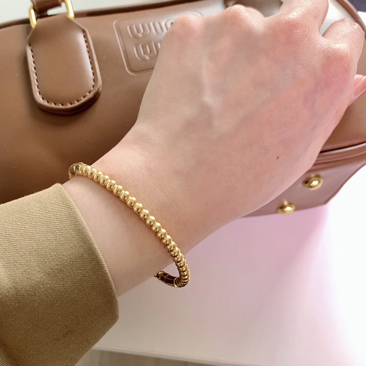 French Retro Titanium Steel Snakebone Bracelet — Four-Leaf Clover Charm