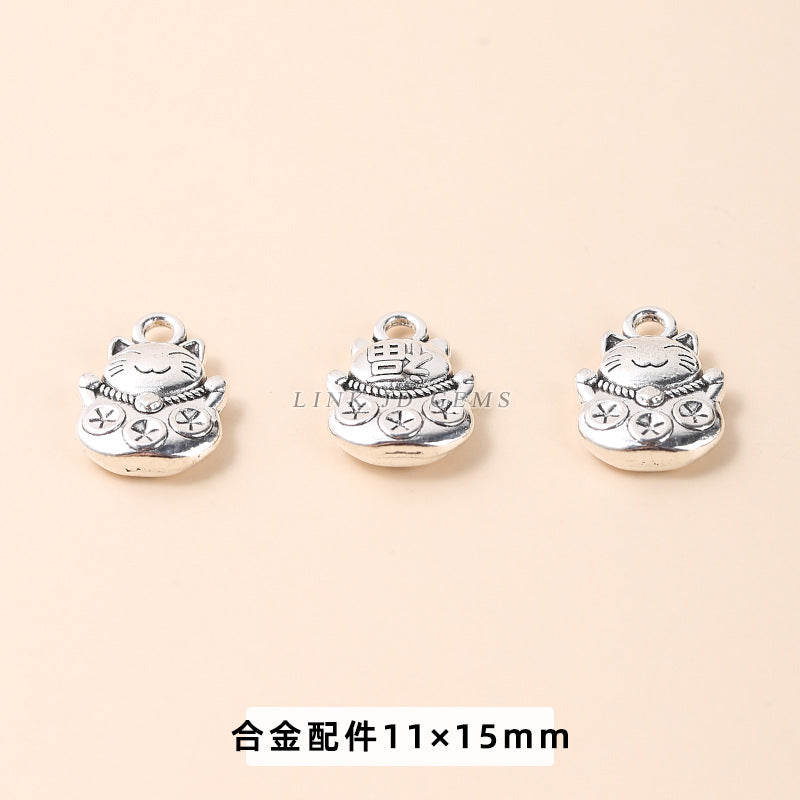 Pequeños accesorios colgantes de aleación de plata tibetana