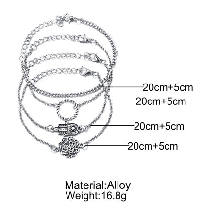 Conjunto de cuatro piezas de pulseras trenzadas con diseño de palmeras huecas 