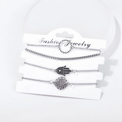 Conjunto de cuatro piezas de pulseras trenzadas con diseño de palmeras huecas 