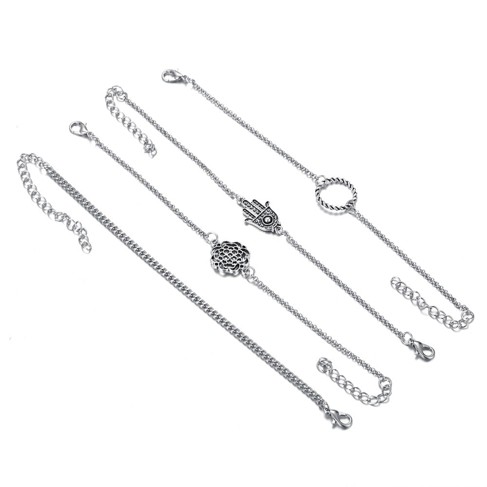 Conjunto de cuatro piezas de pulseras trenzadas con diseño de palmeras huecas 