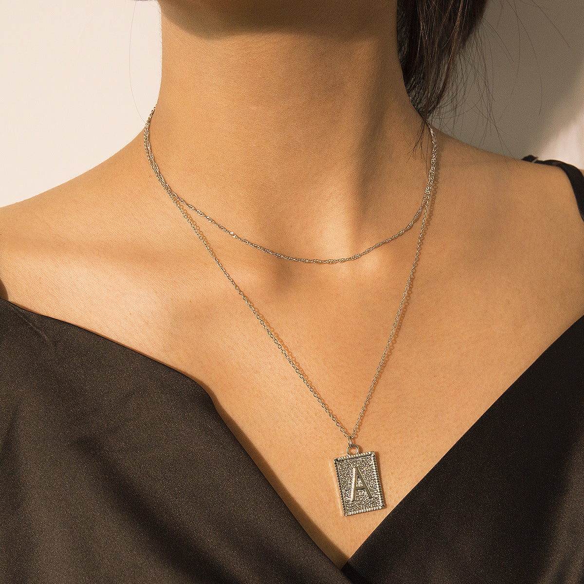 Double A letter tag relief necklace