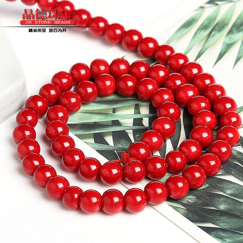 Perlas sintéticas lacadas en rojo 