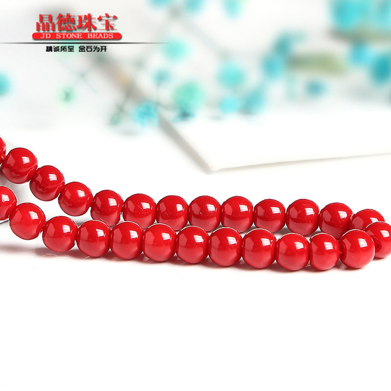 Perlas sintéticas lacadas en rojo 