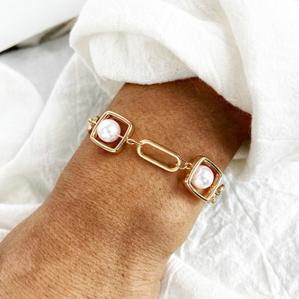 Geometric metal bracelet with pearls