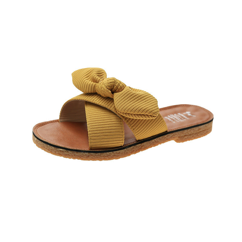 Bow slippers are worn by women in summer
