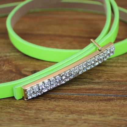 Gold buckle patent leather thin belt