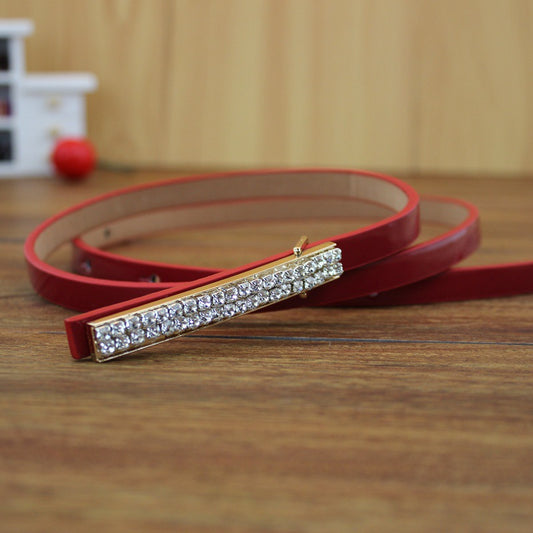 Gold buckle patent leather thin belt