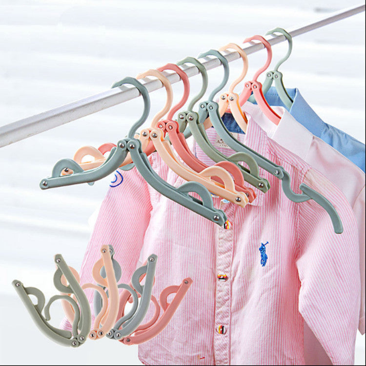 Perchas plegables de plástico portátiles 