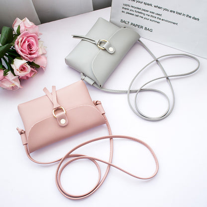 Square bag, shoulder messenger bag, mobile phone bag.