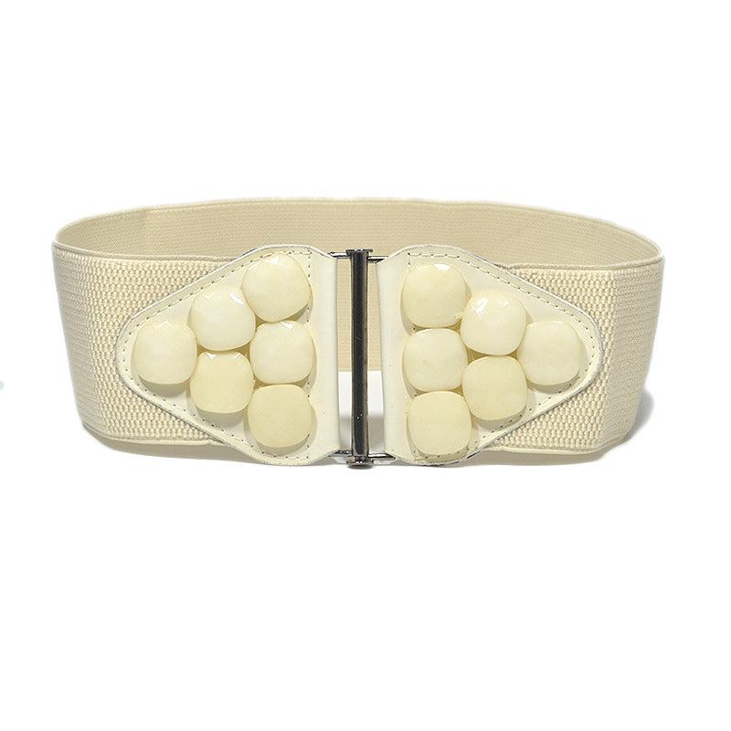 Elastic button waist seal