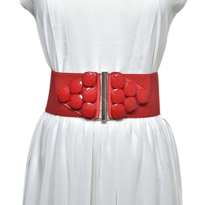 Elastic button waist seal