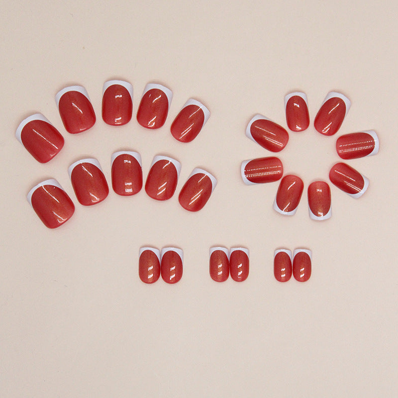 Uñas postizas francesas Aurora cortas en rojo y blanco 