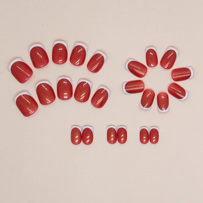 Uñas postizas francesas Aurora cortas en rojo y blanco 