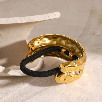 Diadema de acero de titanio dorada 