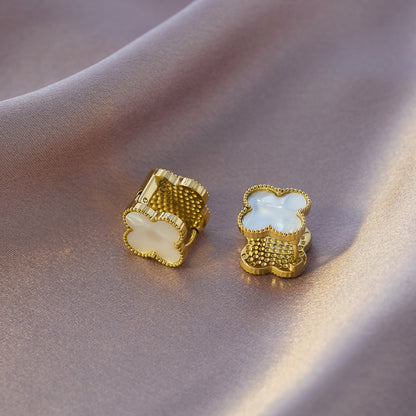 Four-leaf clover titanium steel ear buckle