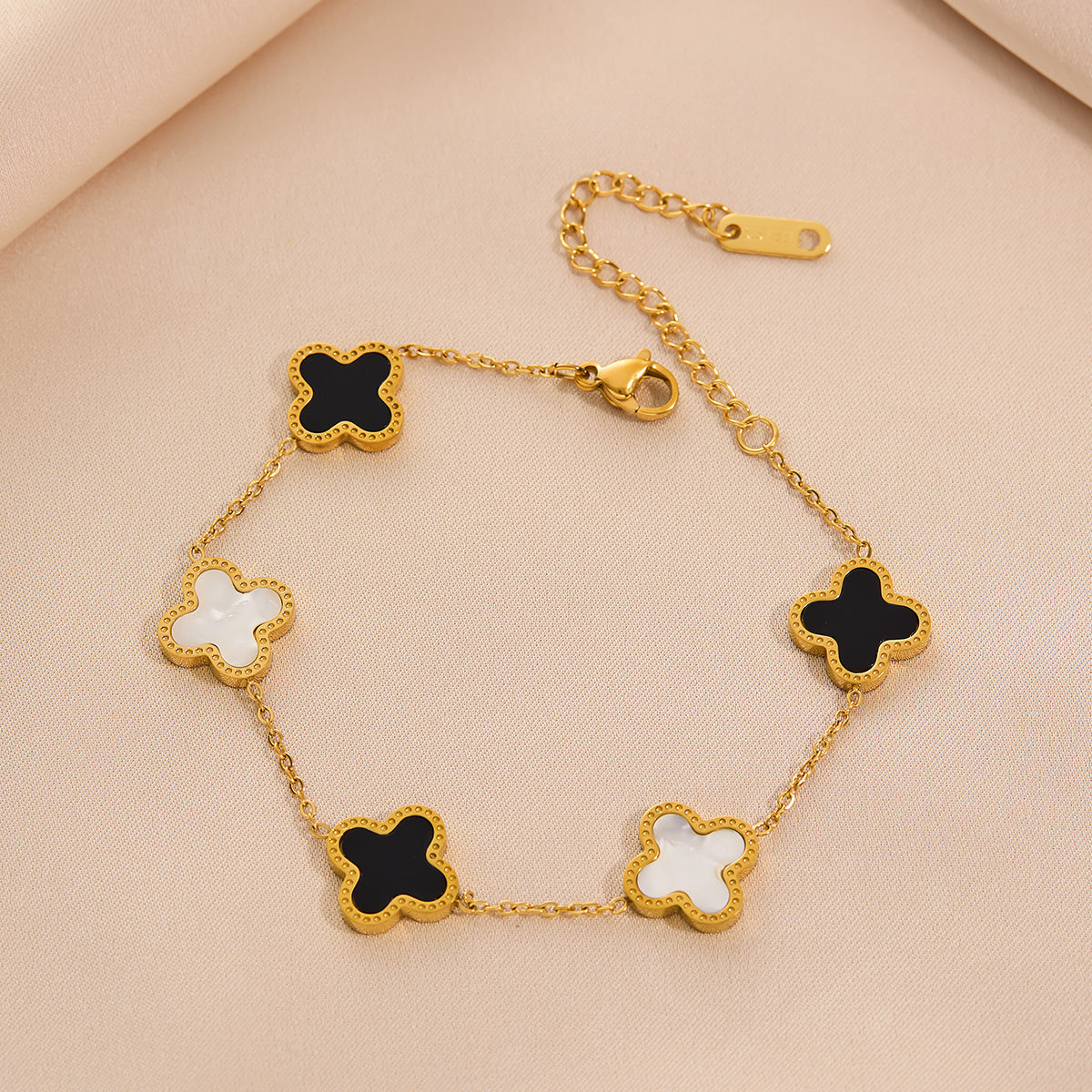 Black and white four-leaf clover titanium steel bracelet