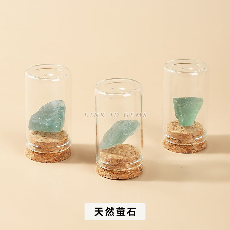 Botella de los deseos con muestra de mineral de roca de cristal 