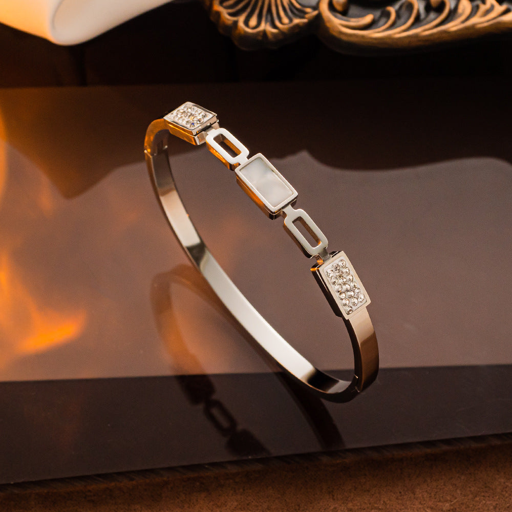 Pulseira de aço inoxidável banhada a ouro, atacado feminino elegante 