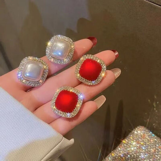 Pendientes de botón de perla roja con diamantes