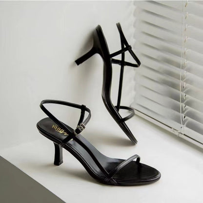 Stiletto heels with a buckled heel