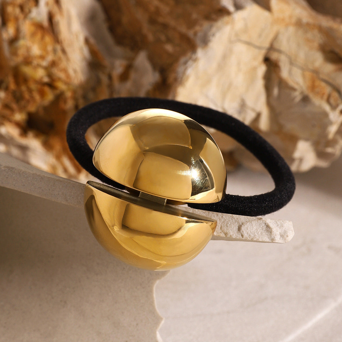 Banda para el cabello de acero y titanio dorado 