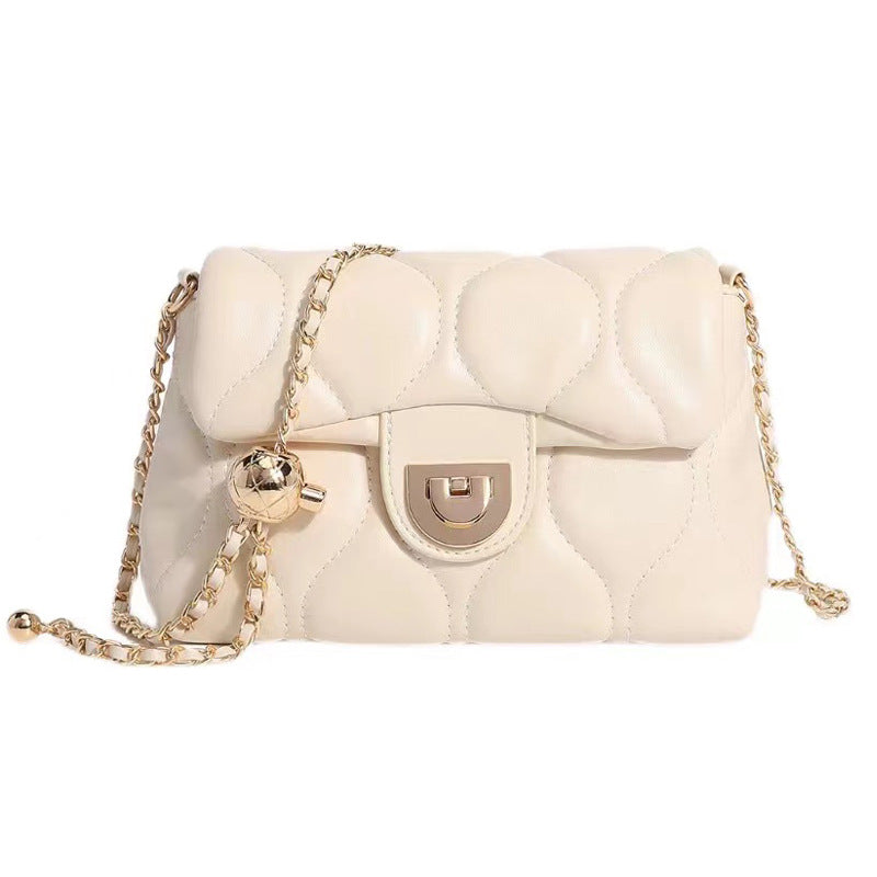 Diamond-patterned Chanel style messenger bag