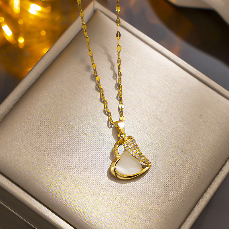 Colar de aço inoxidável banhado a ouro com pingente de olho de gato 