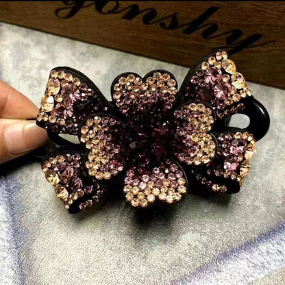Horquilla con forma de pico de pato y mariposa tridimensional con diamantes de imitación 
