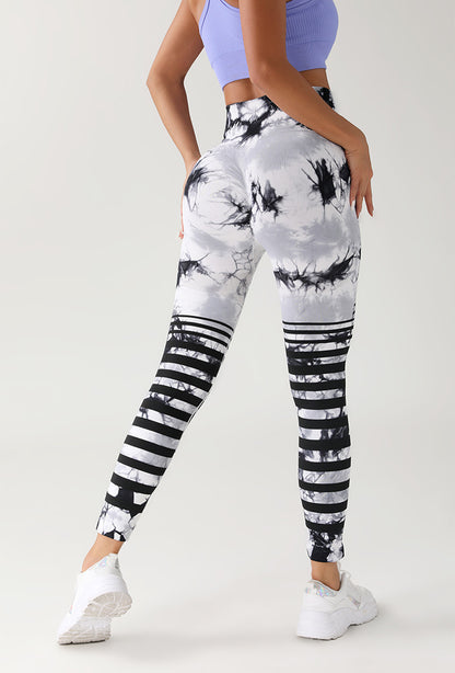 Euro Trendy Pantalones de yoga con levantamiento de glúteos y cintura alta sin costuras con efecto tie-dye 