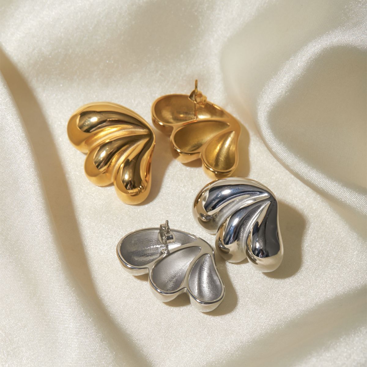 Three-petal teardrop butterfly earrings