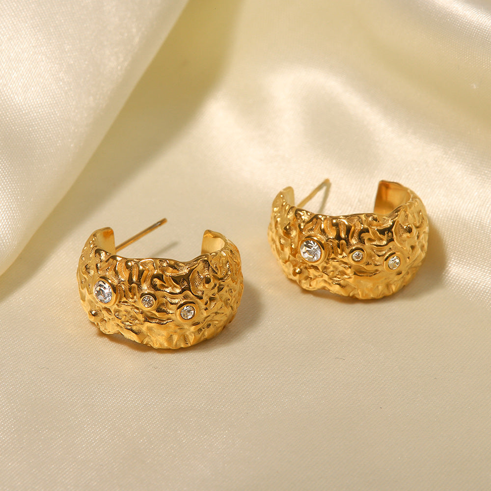 C-shaped white diamond earrings