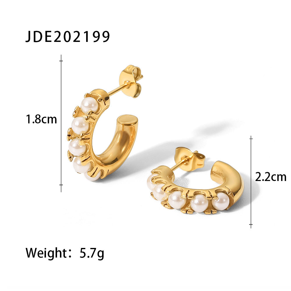 Pearl inlaid C-shaped earrings