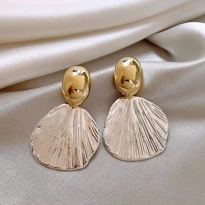 Pendientes con diseño de conchas