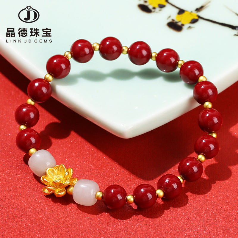 Pulsera de loto de metal arena dorada morada. 
