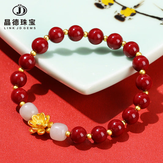 Pulsera de loto de metal arena dorada morada. 