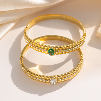 Brazalete vintage de acero inoxidable con circonitas verdes 