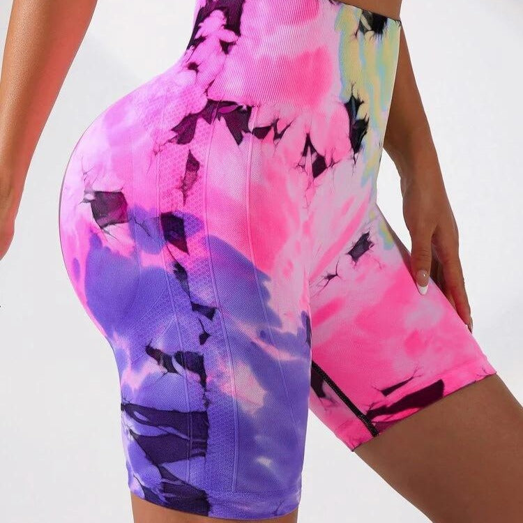 Pantalones cortos de yoga europeos sin costuras con efecto tie-dye color melocotón y levantamiento de glúteos 