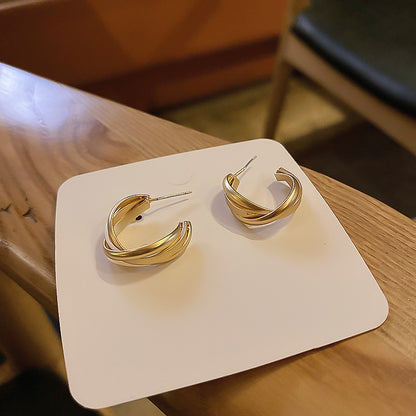 Pendientes de plata S925 con forma geométrica de cara retorcida y aguja