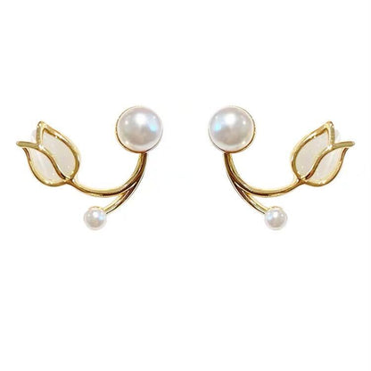 A pair of tulip flower pearl stud earrings.