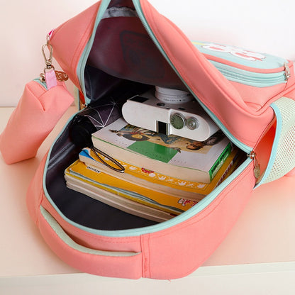 Mochila transpirable con protección de espalda y reducción de carga para estudiantes de primaria 