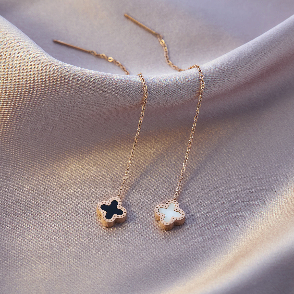 Four-leaf clover titanium steel ear buckle