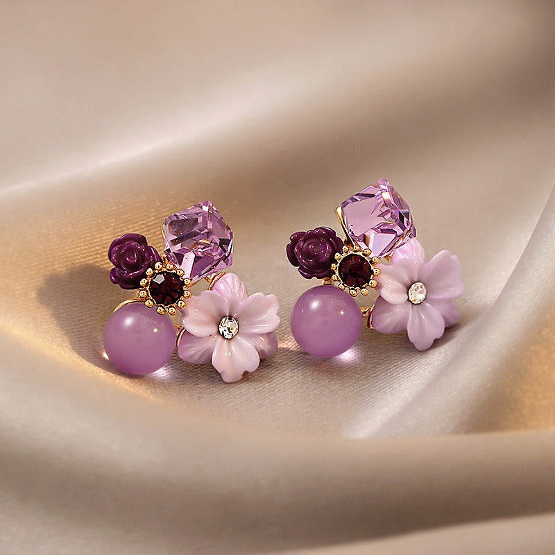 Pendientes de flores de cristal morado 