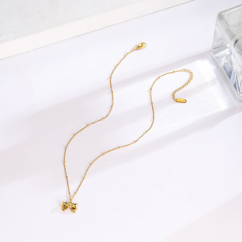 Women's Titanium Steel Bow & Gold Bead Collarbone Necklace