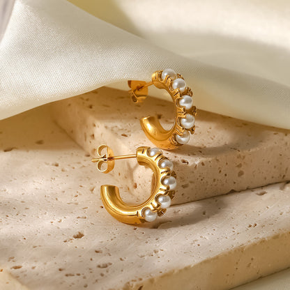 Pearl inlaid C-shaped earrings