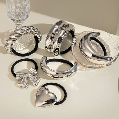 Accesorios para el cabello de acero de titanio. 